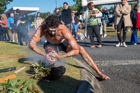 Aboriginal dancer and smoking ceremony at Coffs Harbour Airport on Gumbaynggirr Country